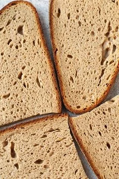 Whole wheat bread. High resolution brown bread texture background. Baking bre Stock Photos