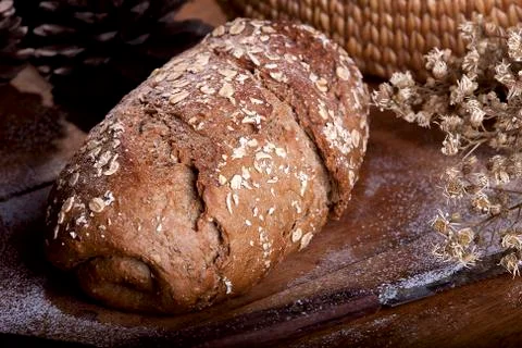 Whole wheat bread on kitchen table Stock Photos