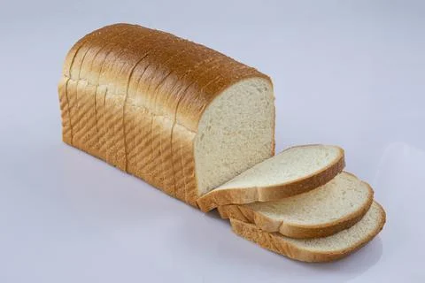 Whole wheat bread slices on a white background 写真素材