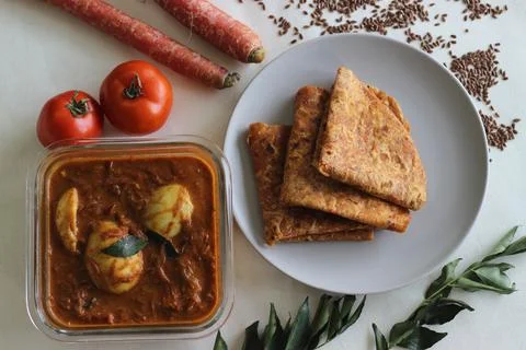 Whole wheat Indian flat bread made of grated carrots and powdered flax seed s Stock Photos