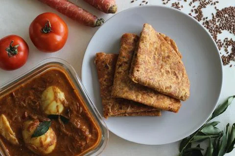 Whole wheat Indian flat bread made of grated carrots and powdered flax seed s Stock Photos