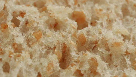 Wholemeal bread macro close up presentation slowly rotating stock footage Stock Footage 344686658