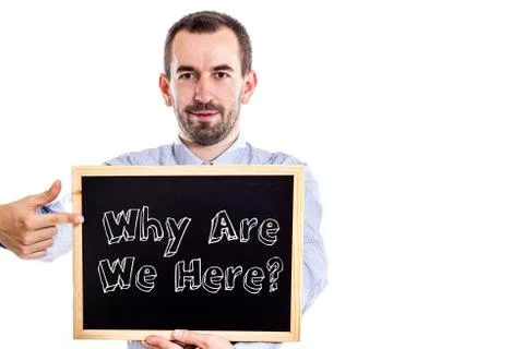 Why Are We Here? - Young businessman with blackboard Stock Photos