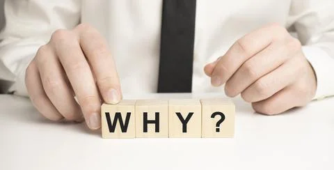 WHY cube blocks on white background. Wooden blocks with the word WHY. Why woo Stock Photos