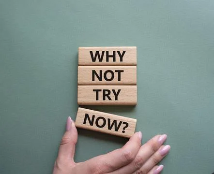 Why not try symbol. Concept words Why not try on wooden blocks. Beautiful g.. Stock Photos