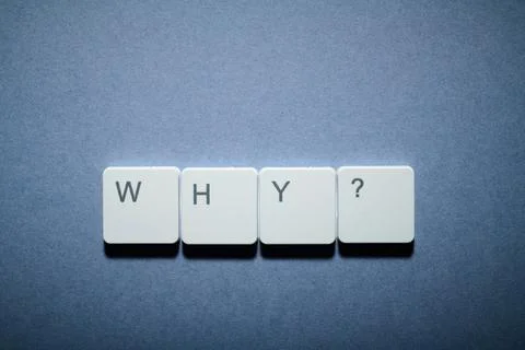 Why question text written witk white keys of a keyboard Stock Photos