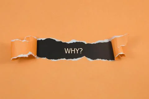 WHY? word under torn paper Foto stock