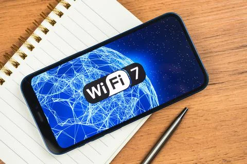 Wi-Fi 7 generation background, icon close-up. Smartphone supporting new Wi-Fi Stock Photos