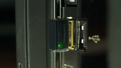 Wi-Fi adapter with green is connected to the computer usb port Stock Footage 104043720