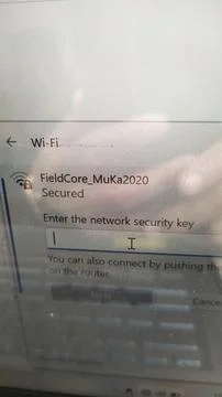 A Wi-Fi connection interface displaying a secured network and prompt for a .. Stock Photos
