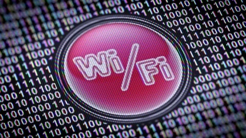 Wi-Fi icon. Binary code ( array of bits ) in the screen. Looping footage Video stock 110740640