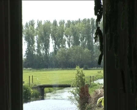 Wick mill passed from window Stock Footage 7909579
