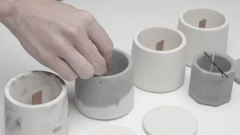 Wick Is Placed In A Concrete Candle Form Video stock 182385078