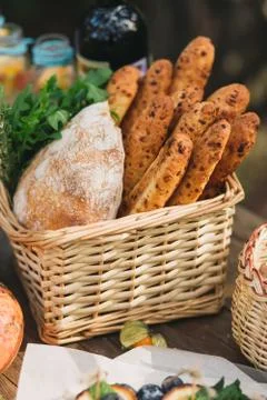 Wicker basket with bread Stock Photos