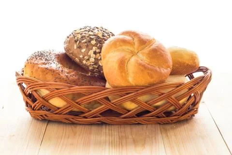 Wicker basket different types bread rolls Stock Photos