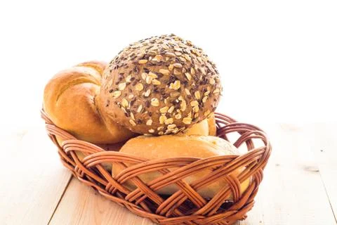 Wicker basket different types bread rolls Stock Photos