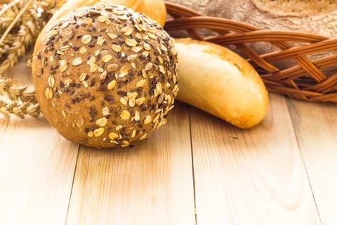 Wicker basket different types bread rolls Stock Photos