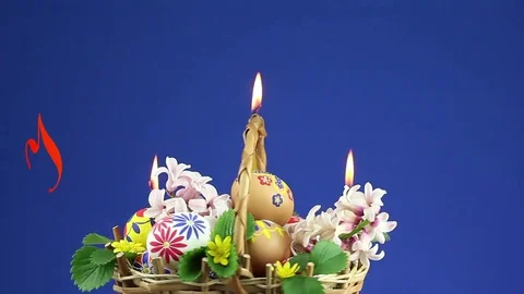 A wicker basket with Easter eggs revolves and appears the text "Happy Easter" Stock-Footage 74405206