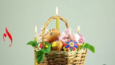 A wicker basket with Easter eggs revolves and appears the text "Happy Easter" Stock-Footage 74424941