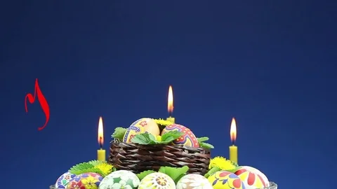 A wicker basket with Easter eggs revolves and appears the text "Happy Easter" Stock Footage 74472595