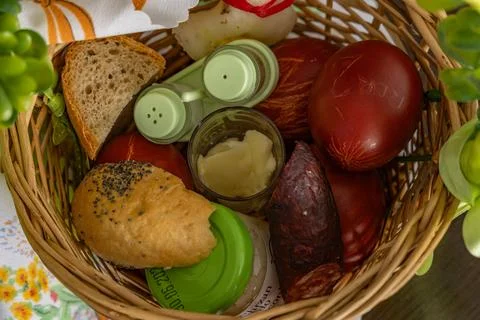 Wicker basket with food Easter decorations Stock Photos