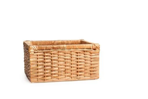Wicker basket on a white background with copy space Foto stock