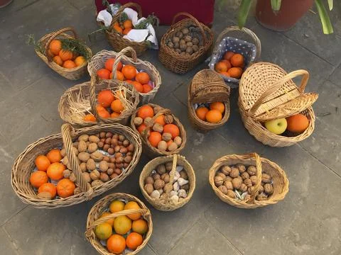 Wicker baskets filled with freshly picked oranges Stock Photos