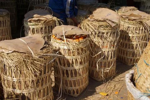 Wicker baskets of oranges Stock Photos