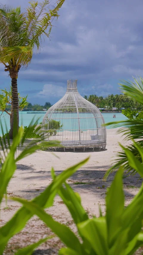 Wicker Cabana Lounge on Bora Bora White Sand Beach with Turquoise Lagoon View. Video stock 342888803