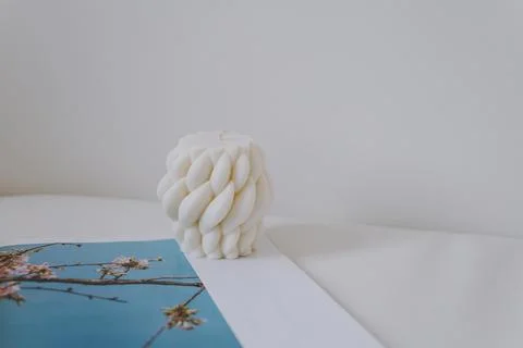 A wicker candle in an interior Stock Photos