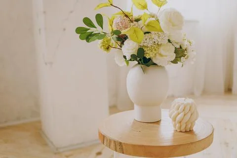 A wicker candle in an interior Stock Photos