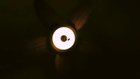 A Wicker Ceiling Fan Needs a Push to Start Spinning Stock Footage