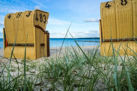 Wicker chairs on the beach Stock Photos