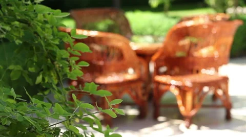 Wicker Chairs in Garden Stock Footage 51015614