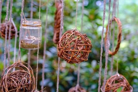 Wicker decorations, balls. decorations, visual elements hung in strings 스톡 사진
