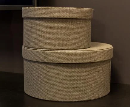 Wicker decorative boxes for storage put one on top of the other. Stock Photos