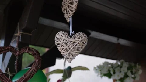 Wicker Hearts Hanging as Wedding Decorations in Outdoor Covered Area Video stock 342065049