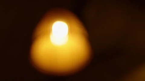 Wicker lampshade with glowing lightbulb hanging indoors Stock Footage 341962008
