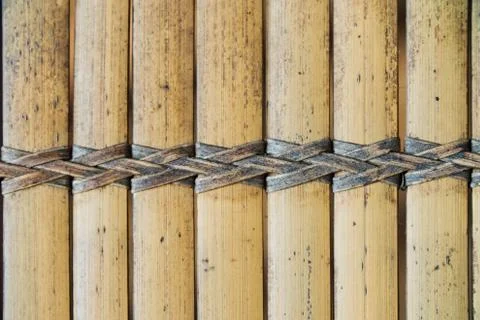 Wicker textile. Texture of straw seamless. Wicker mat from natural beige straw 库存照片