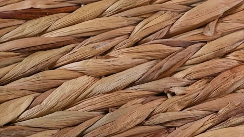 Wicker texture, rattan rotating, closeup. Braided Cane surface 動画素材 233420477