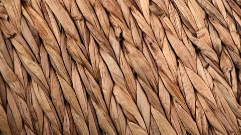 Wicker texture, rattan rotating, closeup. Braided Cane background, surface Stock Footage 330525966