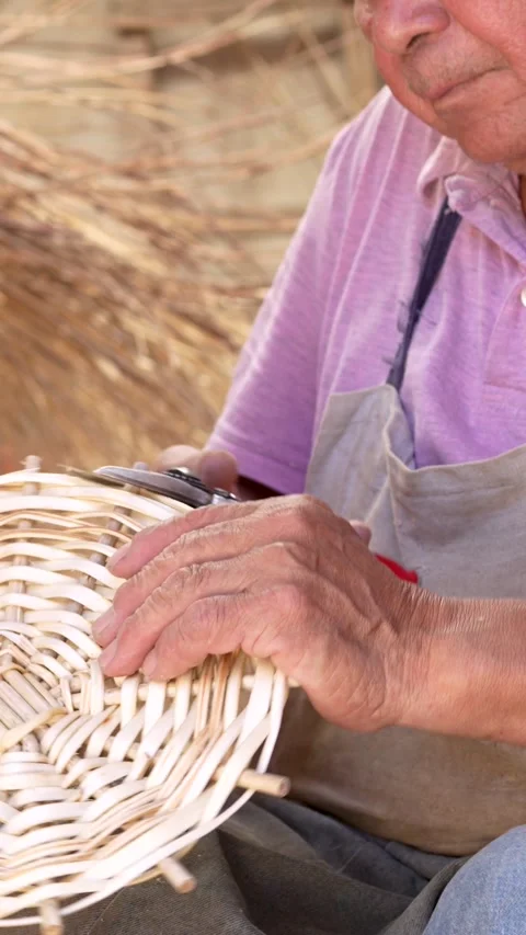 Wicker worker cutting basket at his workshop. Close up video shop. Small bu.. Stock Footage 285425369