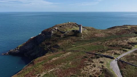 Wicklow Head Front Lighthouse at Dunbur Coast Vídeos de archivo 346979054