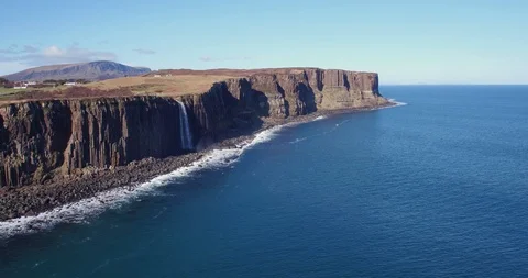 Wid panoramic view of rock formation and waterfall Kilt Rock drone aerial 4K Stock Footage 104582971