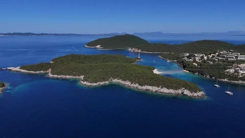 Wide 4K horizontal drone panorama of island archipelago and coastal bay in Greec Stock Footage 340570139