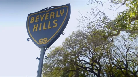 Wide 4K Time Lapse Clouds and Sunset Traditional Beverly Hills Sign Stock Footage 111619002