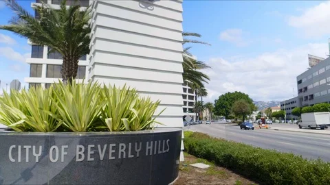 Wide 4K Time Lapse Traffic Modern Beverly Hills Sign Stock Footage 111593356
