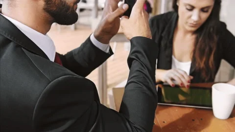 Wide 4k video of middle eastern using app, with hand gestures on smart phone in Stock Footage 201095754