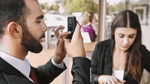 Wide 4k video of middle eastern using app, with hand gestures on smartphone in c Stock Footage 201096495