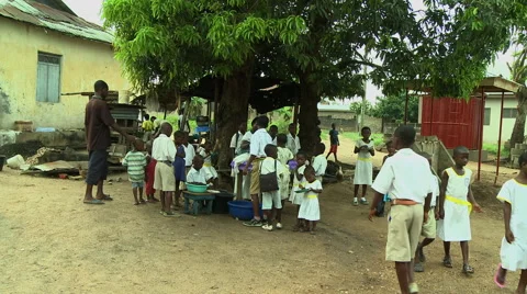 WIDE: ADEISO SCHOOL LUNCH Stock Footage 58070304